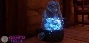 A Glowing Demiguise Statue with a Moon in Hogwarts Legacy
